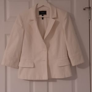 White skirt and blazer suit set